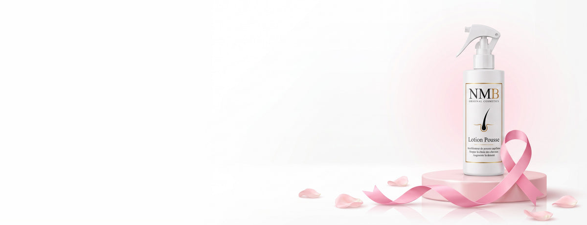 Octobre Rose : Lotion Pousse NMB sur un podium rose avec le ruban rose
